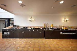 Kuchnia lub aneks kuchenny w obiekcie Eurostars Regina
