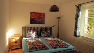アイゼナハにあるVilla Terracottaのベッドルーム1室(枕付)