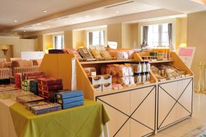 a store filled with lots of boxes on a table at Hiroshima Airport Hotel in Mihara