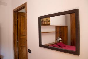 A bed or beds in a room at B&B Selvarossa