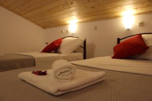 Postel nebo postele na pokoji v ubytování Guesthouse Casetta Verde