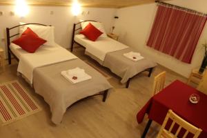 Postel nebo postele na pokoji v ubytování Guesthouse Casetta Verde