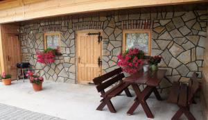 Patio alebo iná vonkajšia časť ubytovania Pokoje Pod Cyrlicą u Józi