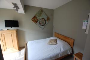 Postel nebo postele na pokoji v ubytování Hotel Piano 2 - Mont-St-Guibert - Louvain-la-Neuve