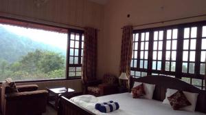 Katil atau katil-katil dalam bilik di Abiyal Mountain Stay