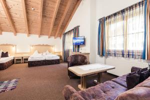 Letto o letti in una camera di Andre Arnold - Boutique Pension