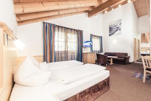 Postel nebo postele na pokoji v ubytování Andre Arnold - Boutique Pension