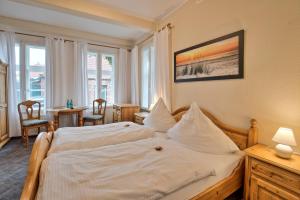 Postel nebo postele na pokoji v ubytování Hotel Packhaus