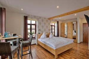 Postel nebo postele na pokoji v ubytování Hotel Packhaus