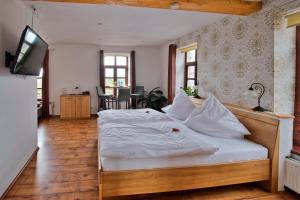 Postel nebo postele na pokoji v ubytování Hotel Packhaus