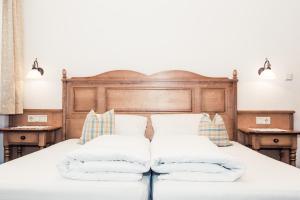 Letto o letti in una camera di Andre Arnold - Boutique Pension