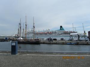 a cruise ship is docked at a dock at Altstadt Ferienwohnung in Wismar