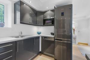 Kuchyň nebo kuchyňský kout v ubytování Øyjorden Apartment + 9 fotografií