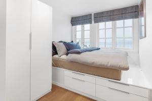 Postel nebo postele na pokoji v ubytování Øyjorden Apartment