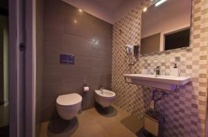 Koupelna v ubytování Borghese Executive Suite