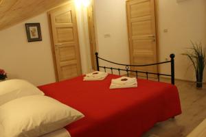 Postel nebo postele na pokoji v ubytování Guesthouse Casetta Verde