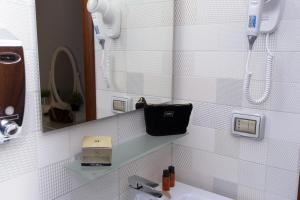 Koupelna v ubytování Borghese Executive Suite