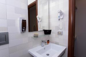 Koupelna v ubytování Borghese Executive Suite