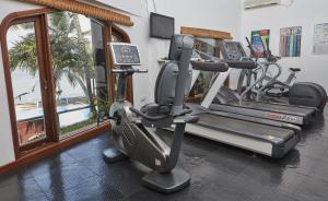The fitness centre and/or fitness facilities at Tamarind Village Hotel Apartments