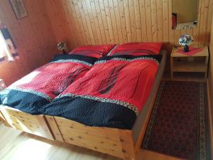 Säng eller sängar i ett rum på Ferienwohnung Duinli
