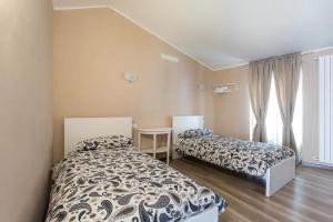 A bed or beds in a room at Villa Mereghetti