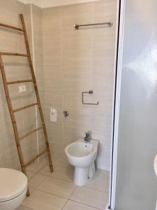 Ein Badezimmer in der Unterkunft Riva San Vito 1