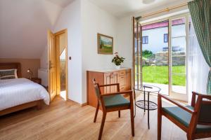 Voodi või voodid majutusasutuse Wellness Hotel Florián České Žleby toas