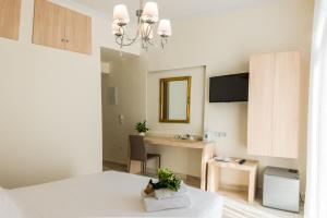 Кухня или кухненски бокс в Castello Boutique Rooms