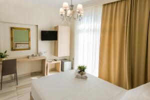 Телевизия и/или развлекателен център в Castello Boutique Rooms