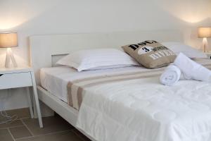 Postel nebo postele na pokoji v ubytování Apartments Rita
