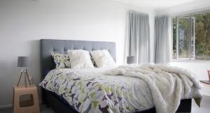 เตียงในห้องที่ Rotorua beauty