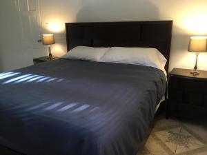One Hamilton Place - Emerald客房内的一张或多张床位