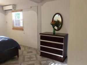 One Hamilton Place - Emerald客房内的一张或多张床位