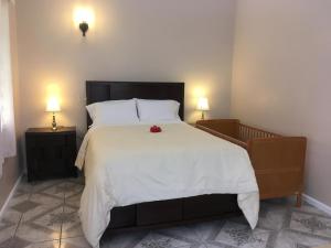 One Hamilton Place - Emerald客房内的一张或多张床位