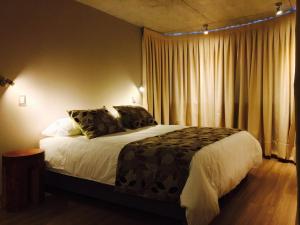 Postel nebo postele na pokoji v ubytování Hotel Amun
