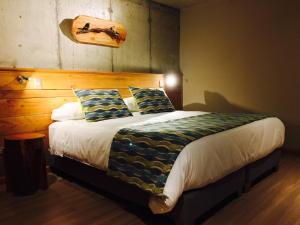 Postel nebo postele na pokoji v ubytování Hotel Amun