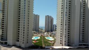 two tall buildings with a pool in between them at Marina Sol in Coquimbo