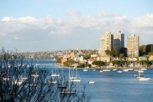 a group of boats in a large body of water at The KC Elizabeth Bay in Sydney