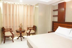 Voodi või voodid majutusasutuse Hotel Rodolfo toas