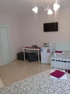TV a/nebo společenská místnost v ubytování Sandanski Peak Guest Rooms