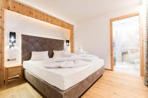 Postel nebo postele na pokoji v ubytování Hotel Eden