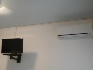 a room with a wall mounted air conditioner on a wall at Meublè Andrea Doria in Torre del Lago Puccini