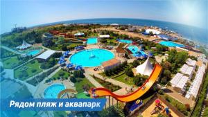 an aerial view of a pool at a water park at Уютная Студия на Парковой 29 in Sevastopol