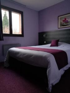 Postel nebo postele na pokoji v ubytování Lys Hôtel