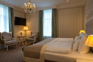 Кровать или кровати в номере Park Hotel & Spa Katharina