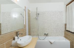 Koupelna v ubytování Hotel Palau