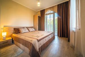 Postel nebo postele na pokoji v ubytování Royal House