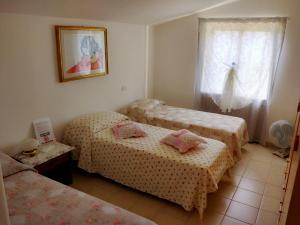 Postel nebo postele na pokoji v ubytování Dai Nonni, B&B a Chieti