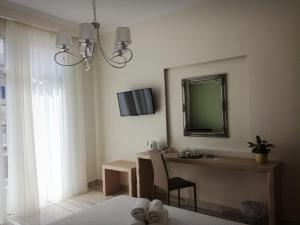 Телевизия и/или развлекателен център в Castello Boutique Rooms