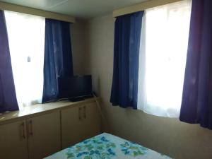 Postel nebo postele na pokoji v ubytování Camp Sita